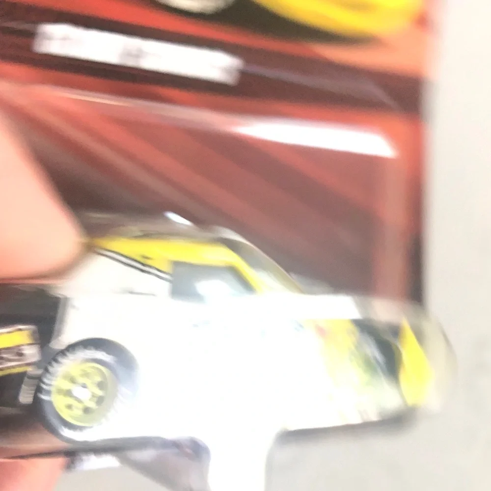 Mattel Disney Pixar Cars Claude Scruggs Toy Car - Yellow and Black